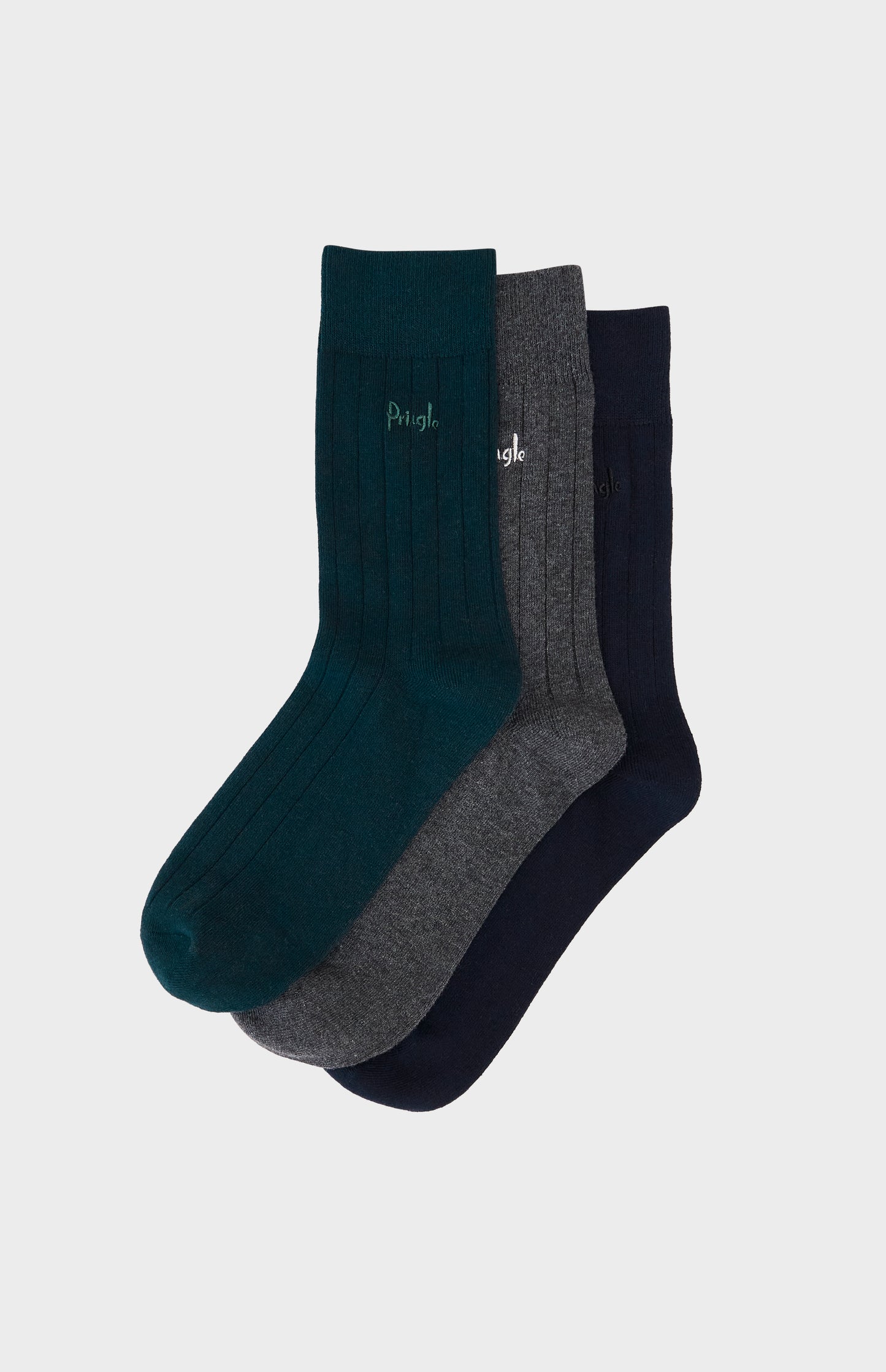 Three pairs of socks in black, gray, and navy on a light gray background