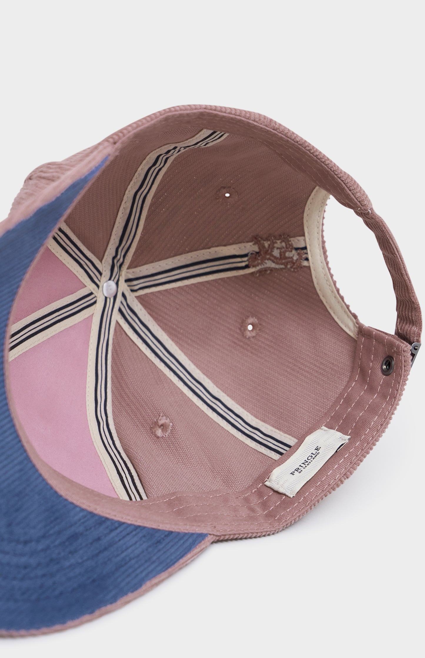 Baseball cap with a patterned back and visible brand logo on a white background