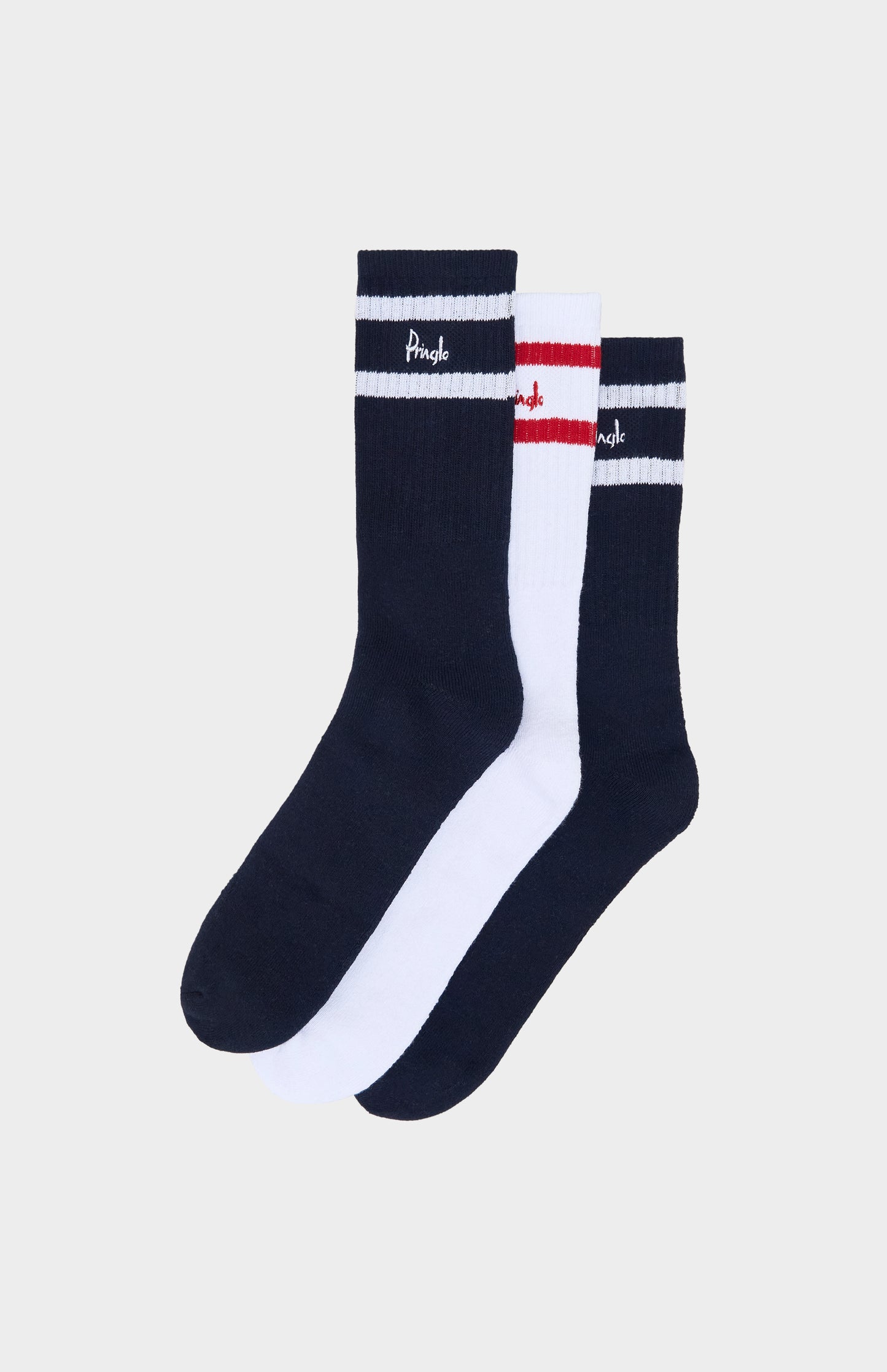 Three pairs of socks with striped patterns on a light gray background
