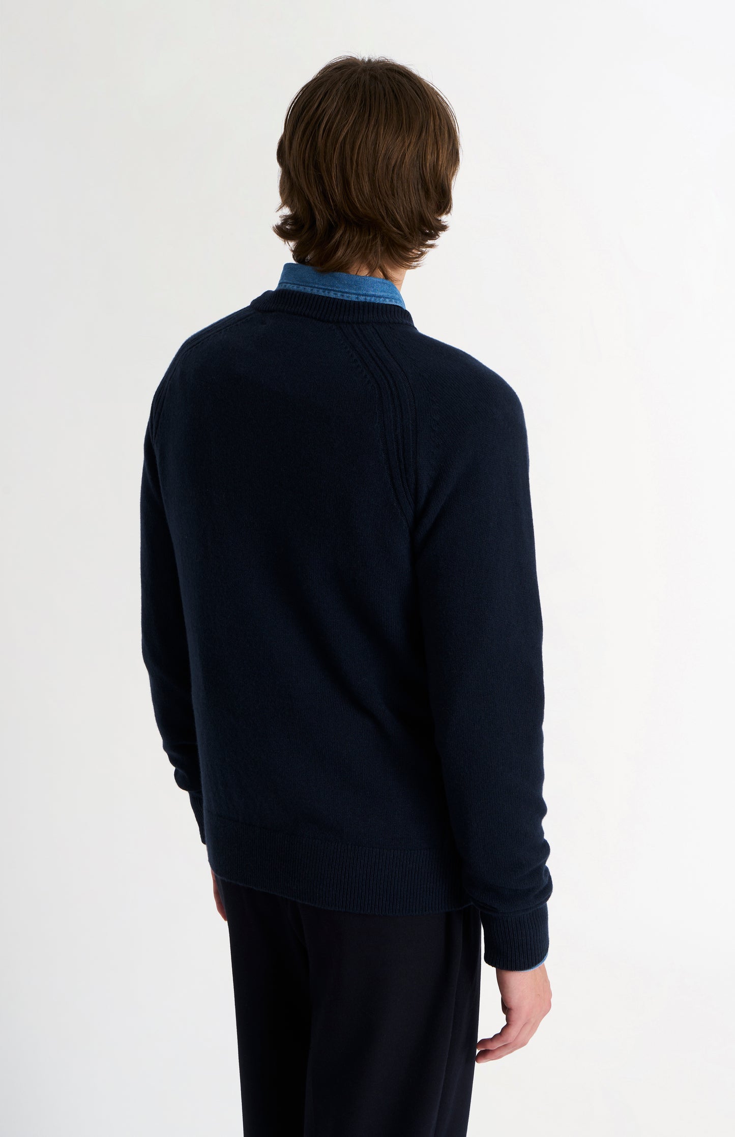 Pringle of Scotland Men’s Lambswool Crew Neck Jumper In Navy Blue back view