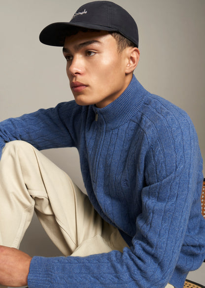Pringle of Scotland Men's Quarter Zip Lambswool Jumper in Dark Indigo on sitting model