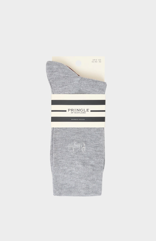Gray socks with Pringle branding on a white background