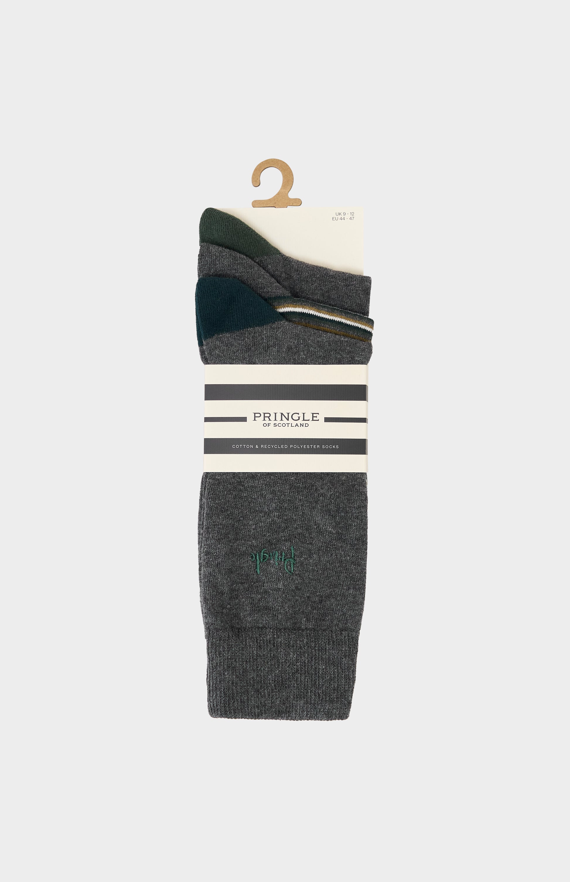 Grey socks with green and blue detailing and a Pringle logo embroidery
