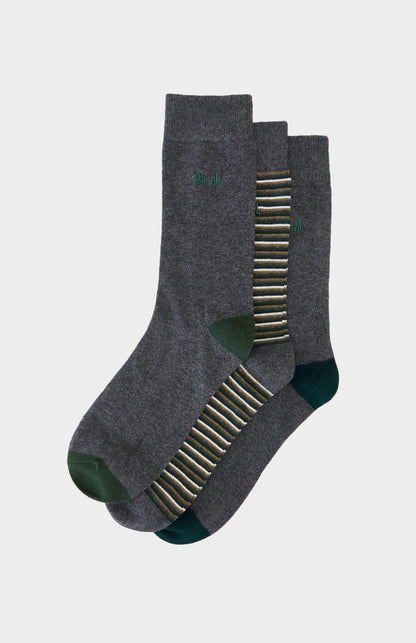 Grey socks with green and blue detailing and a Pringle logo embroidery