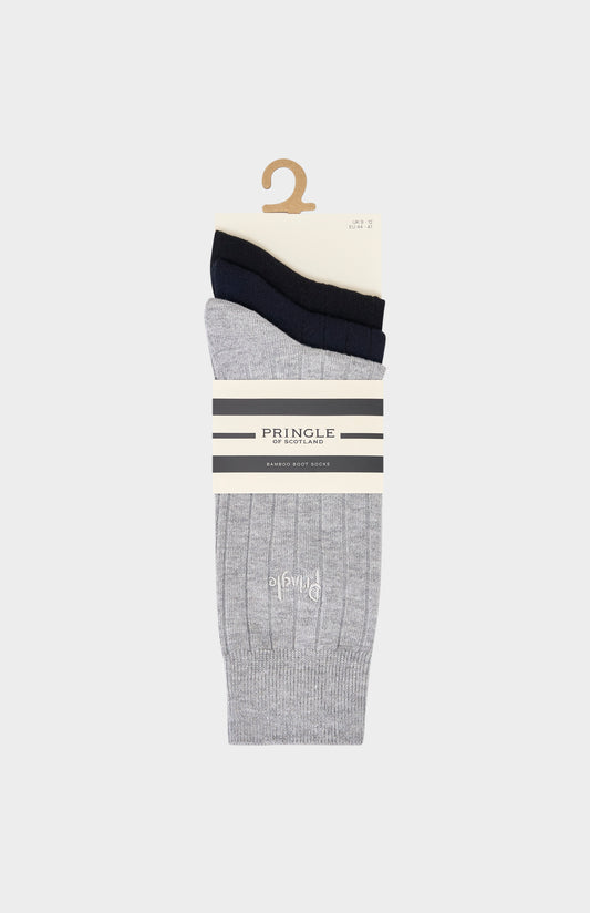 Three pairs of socks on a hanger with Pringle branding against a white background