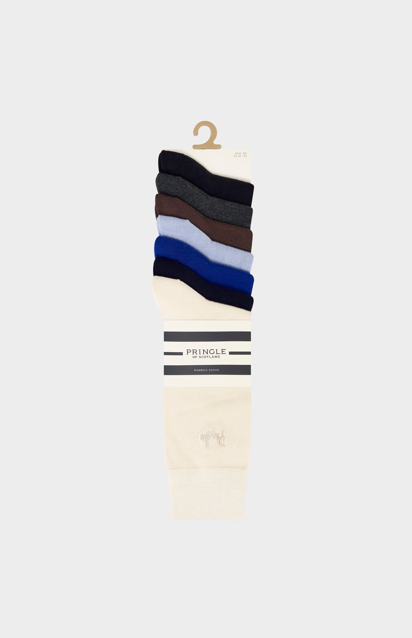 Set of Pringle socks stacked on a hanger against a white background
