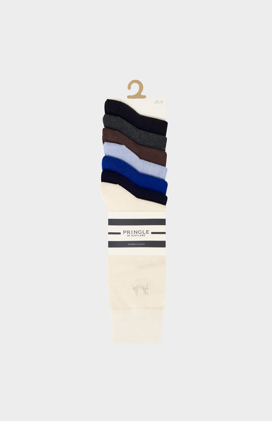 Set of Pringle socks stacked on a hanger against a white background