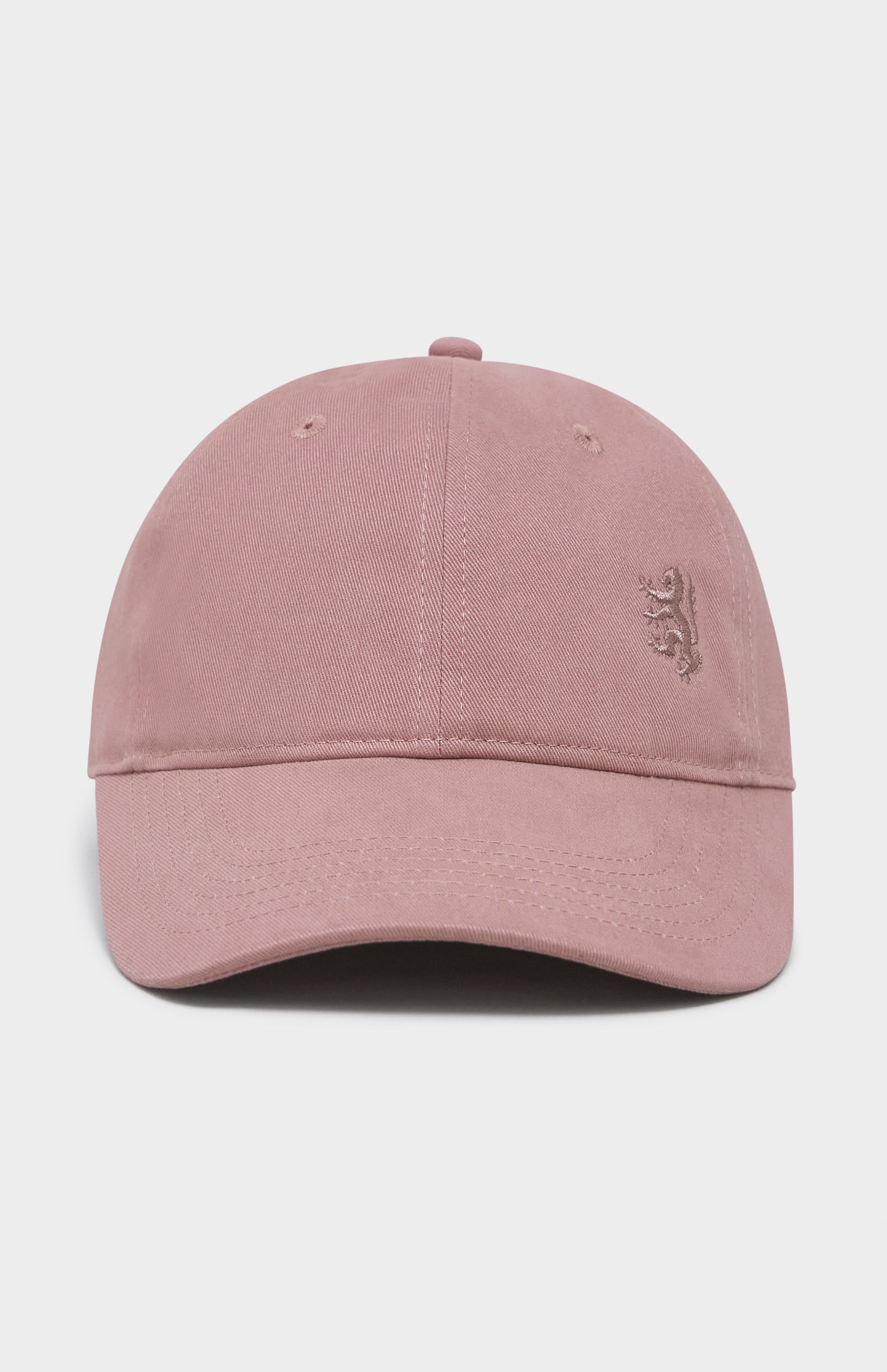 Dusty pink baseball cap with tonal lion logo embroidered on the right hand side