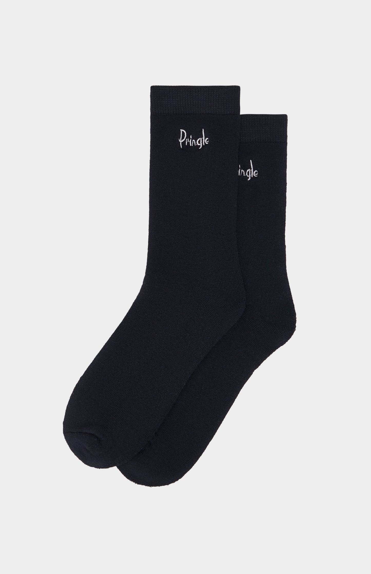 Two black socks with 'Pringle' branding on a light gray background