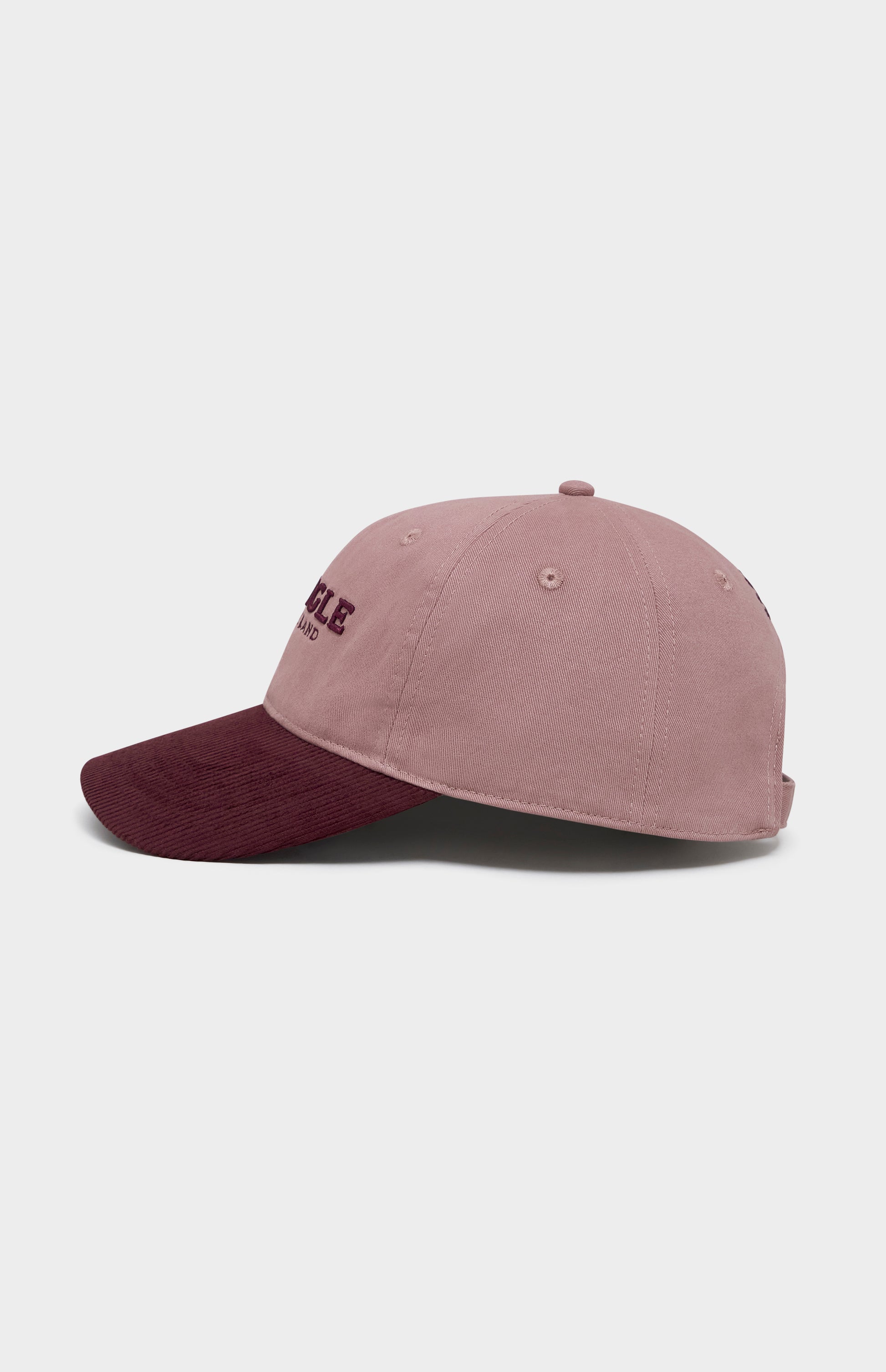 Pink and burgundy baseball cap with PRINGLE OF SCOTLAND embroidered on the front