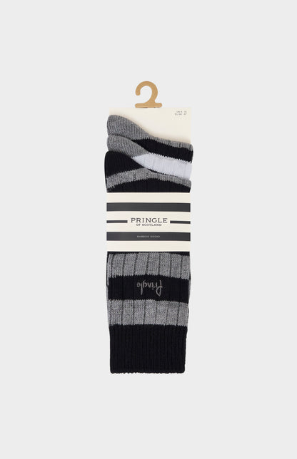 Set of black, white and grey striped socks on a white background with pringle branding