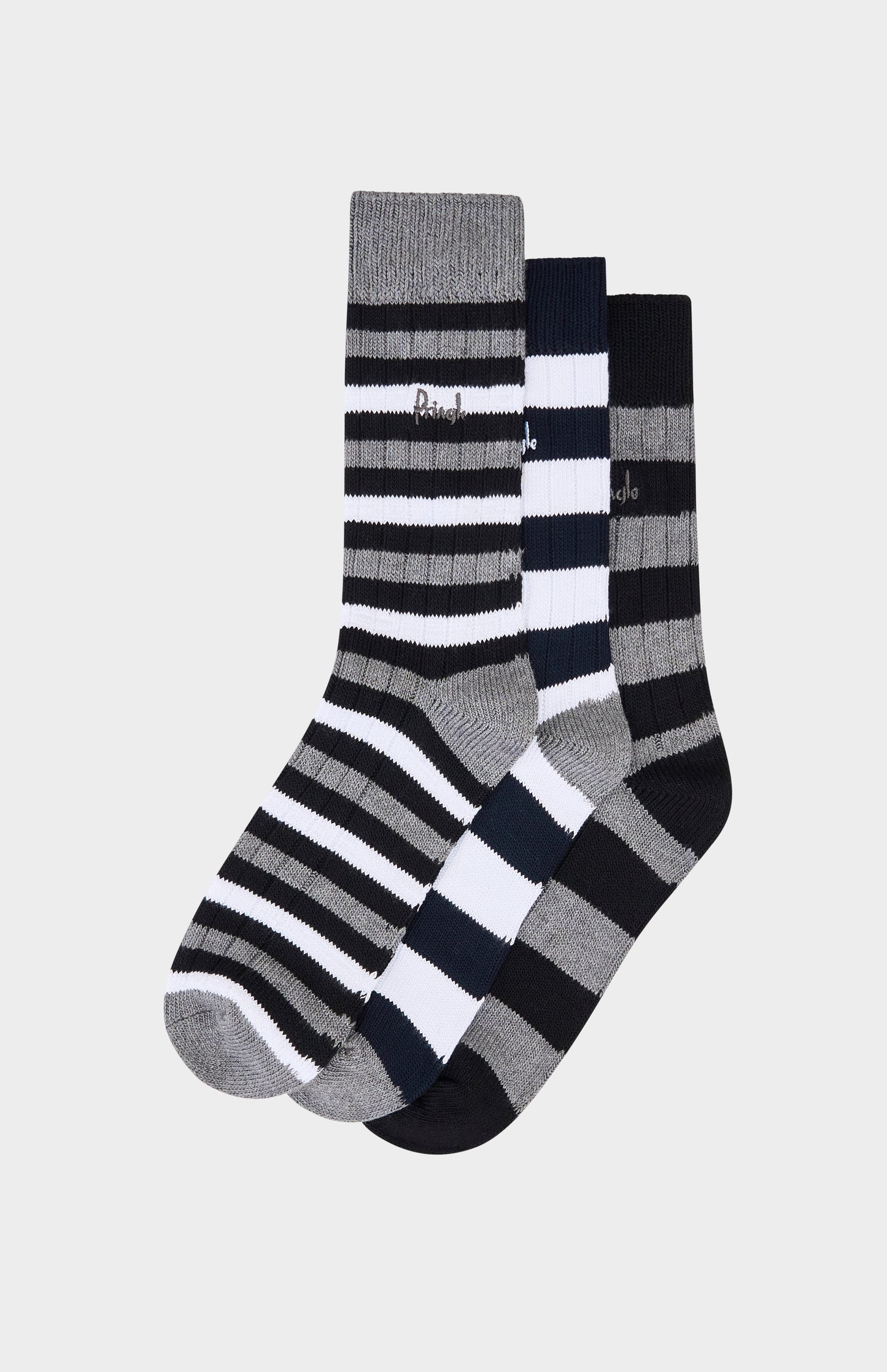 Set of black, white and grey striped socks on a white background with pringle branding