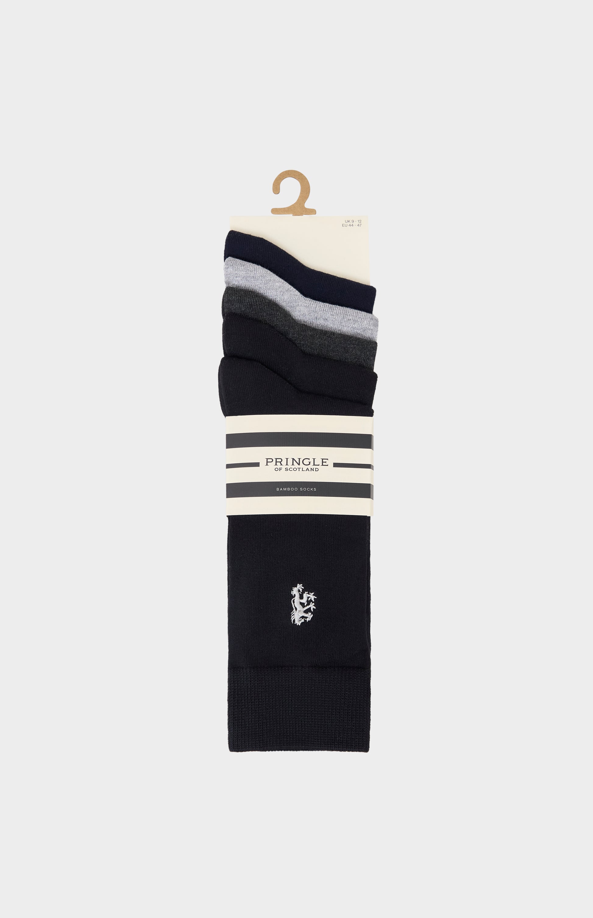 Stack of black and gray socks on a hanger with Pringle lion branding