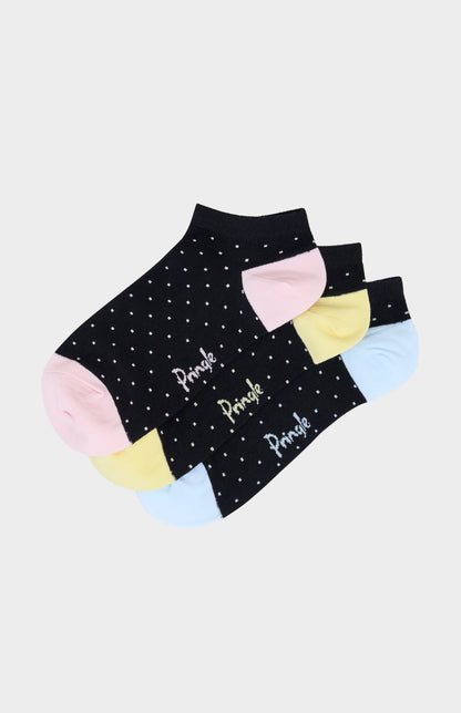 Trainer socks with blue, pink, and yellow polka dots against a white background
