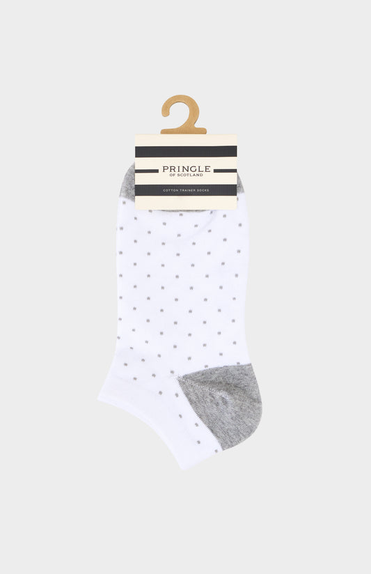 White socks with grey polka dots and gray toes and heels on a hanger against a white background, featuring the brand 'Pringle'.