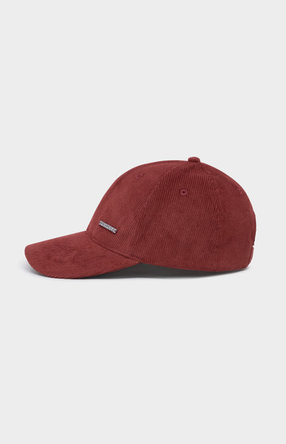 Red cap on a light gray background