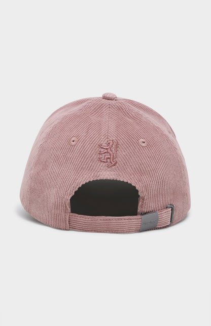 Pink corduroy cap with a logo on the back against a white background