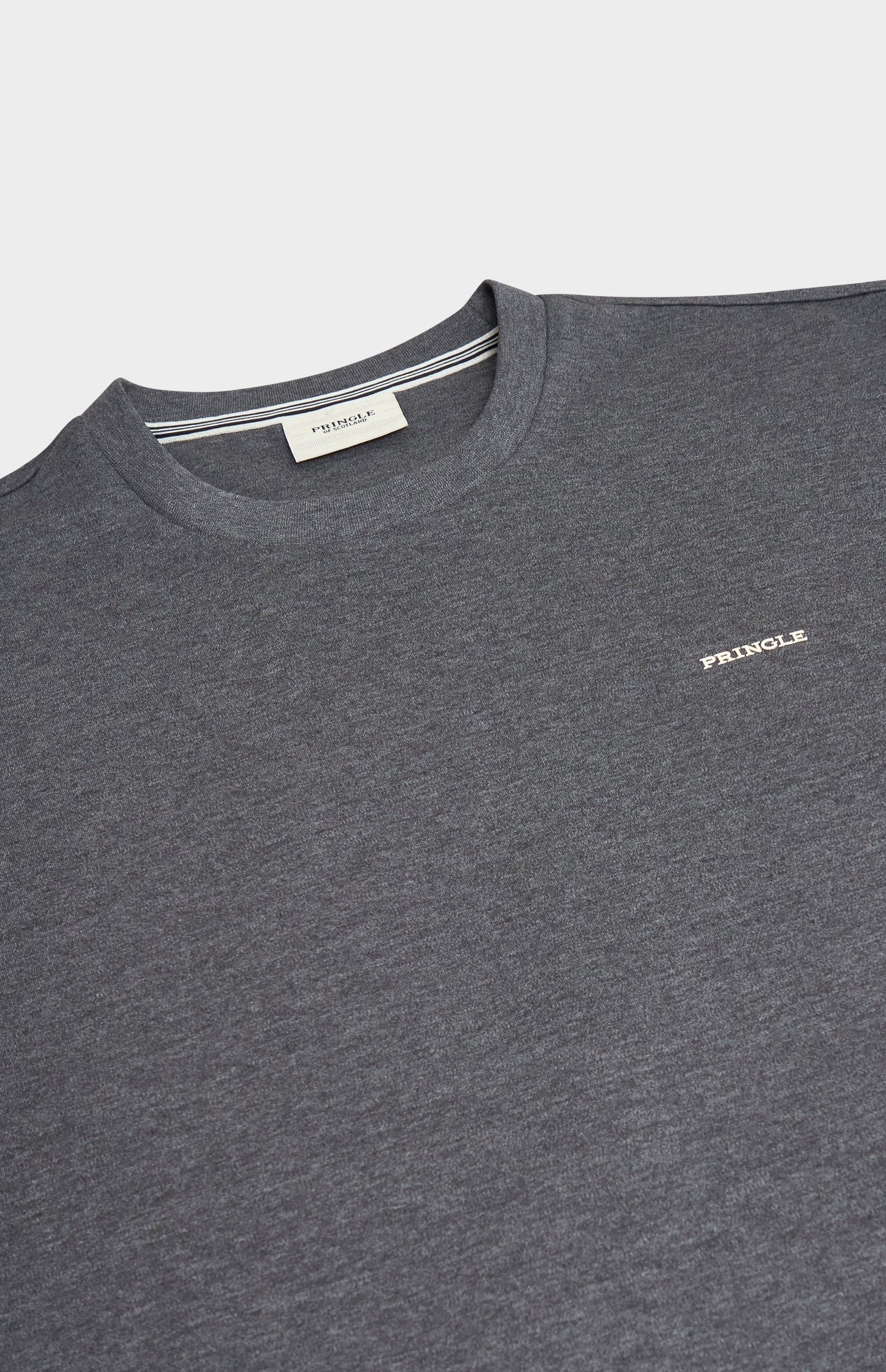 Dark gray t-shirt with a brand logo on a light gray background
