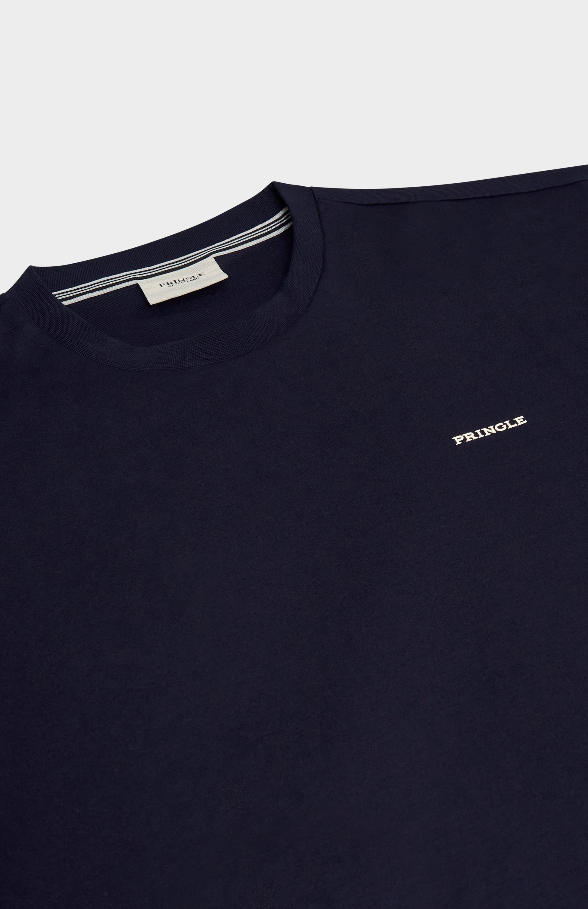 Navy blue t-shirt with 'Pringle' logo on a light gray background