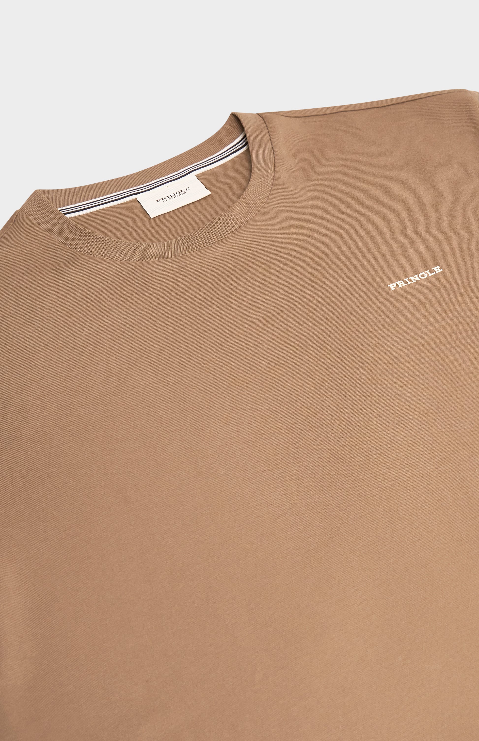 Brown t-shirt with a small logo on a white background