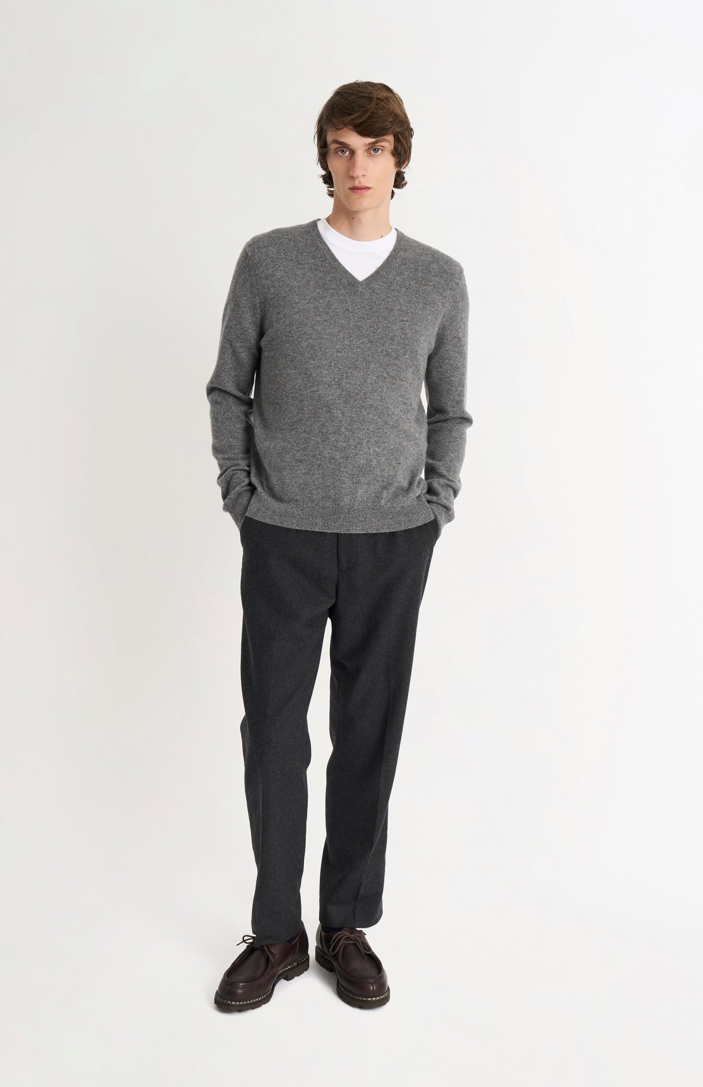 Pringle of Scotland Men’s Cashmere V-Neck Jumper In Light Grey Melange on standing model