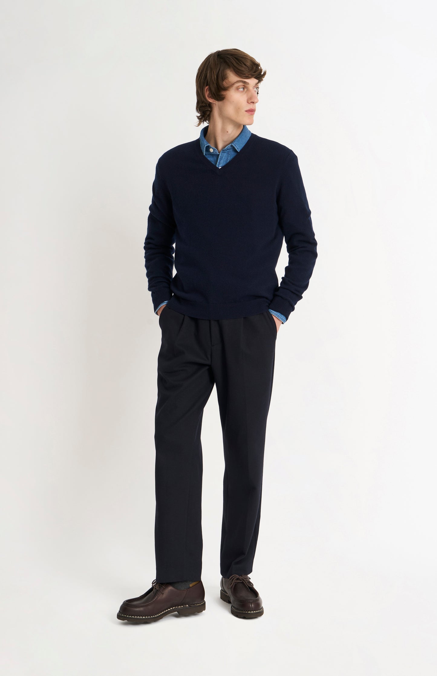 Pringle of Scotland Men’s Cashmere V-Neck Jumper In Navy Blue on standing model