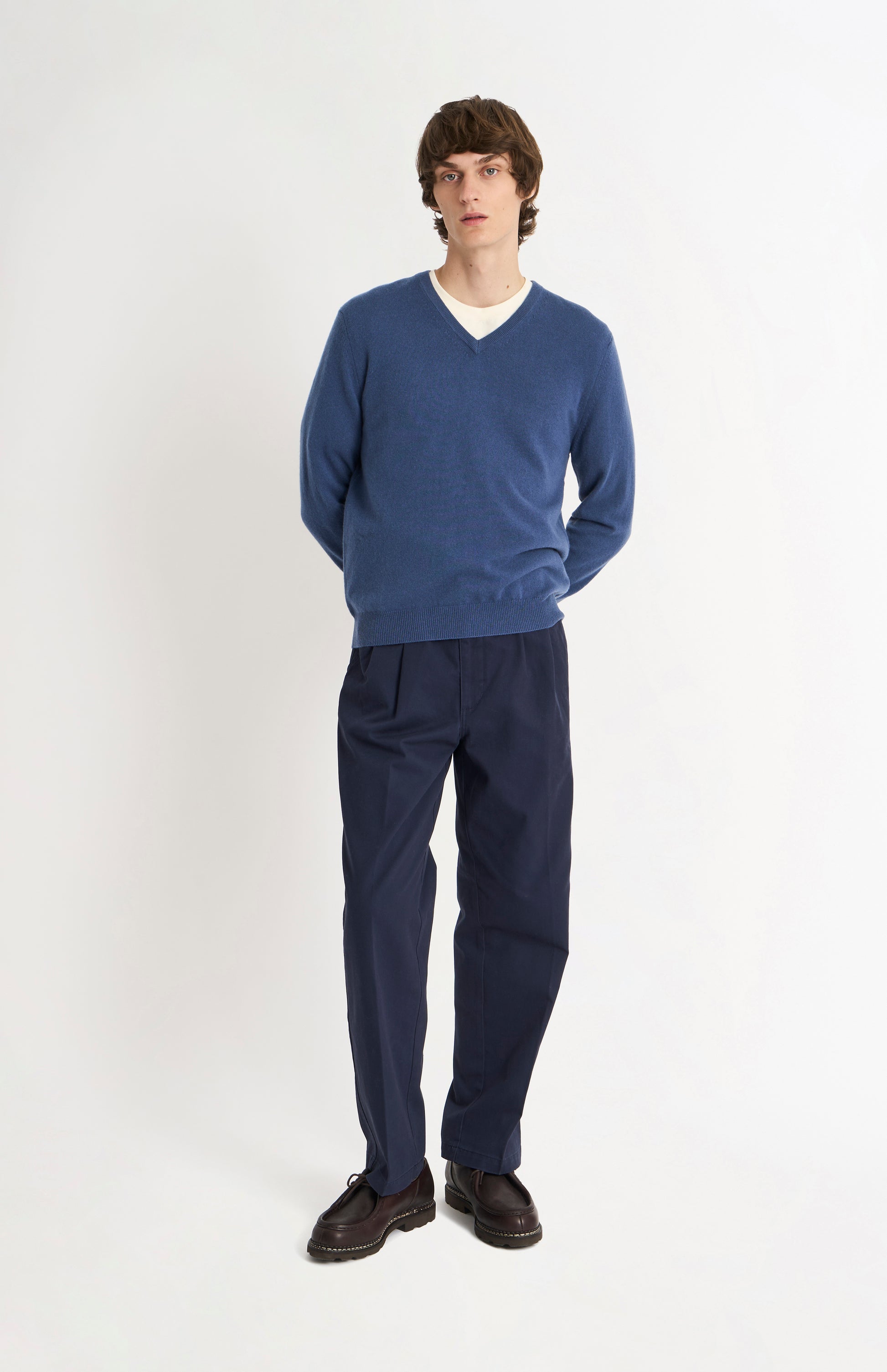 Pringle of Scotland Men’s Cashmere V-Neck Jumper In Bering Sea Blue on standing model