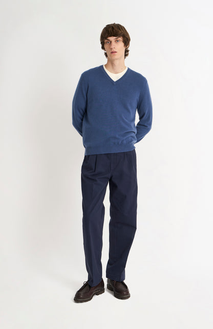 Pringle of Scotland Men’s Cashmere V-Neck Jumper In Bering Sea Blue on standing model