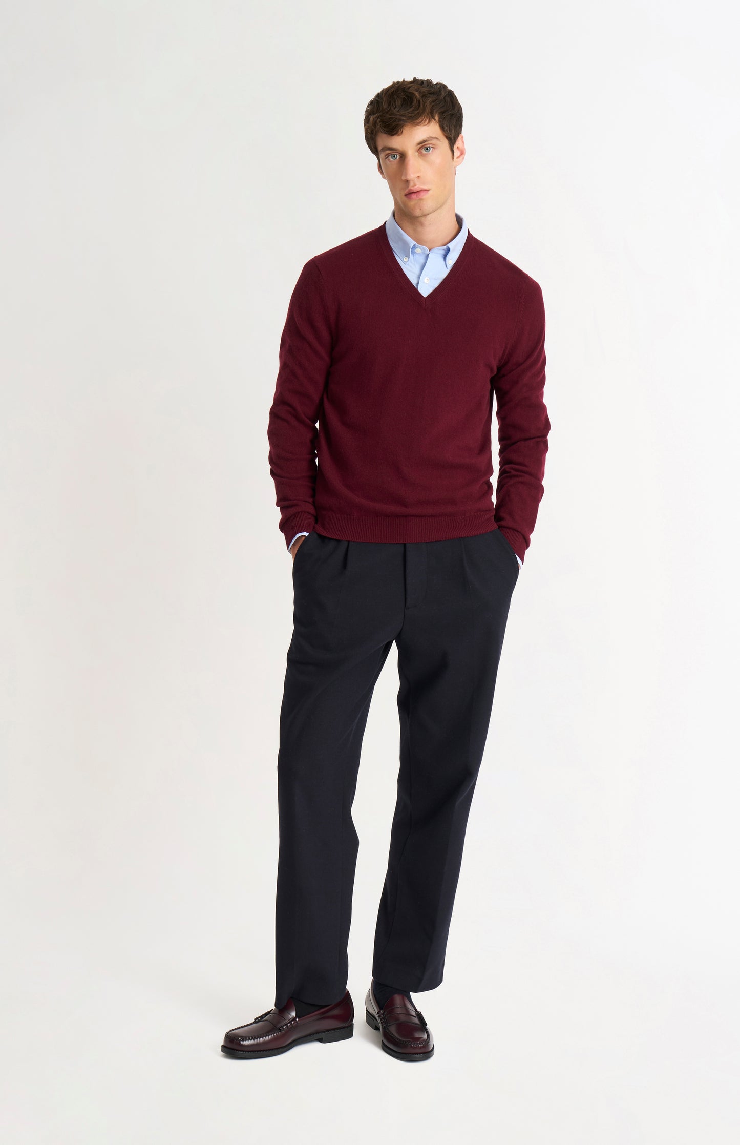 Pringle of Scotland Men’s Cashmere V-Neck Jumper In Burgundy on standing model