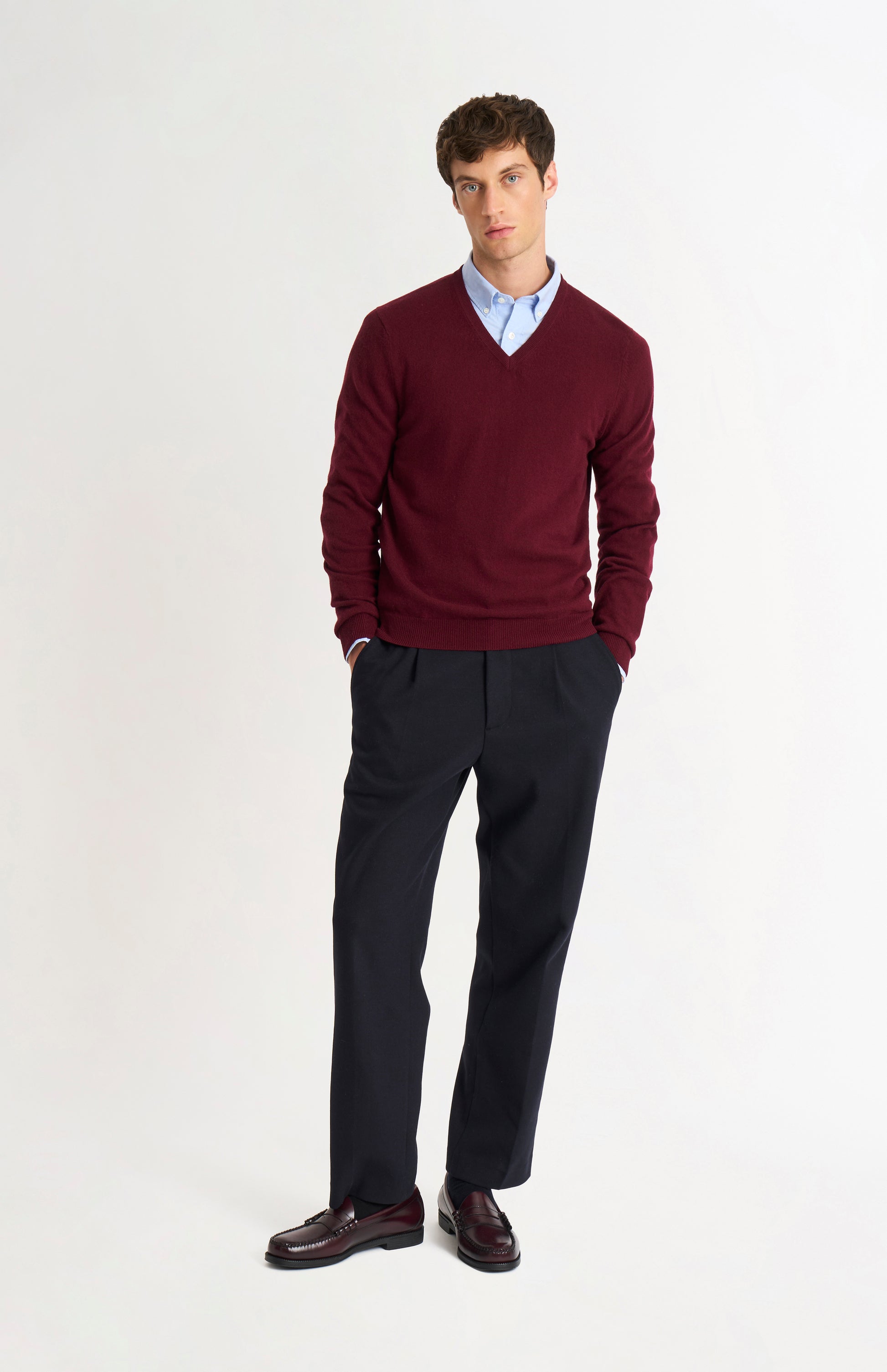 Pringle of Scotland Men’s Cashmere V-Neck Jumper In Burgundy on standing model