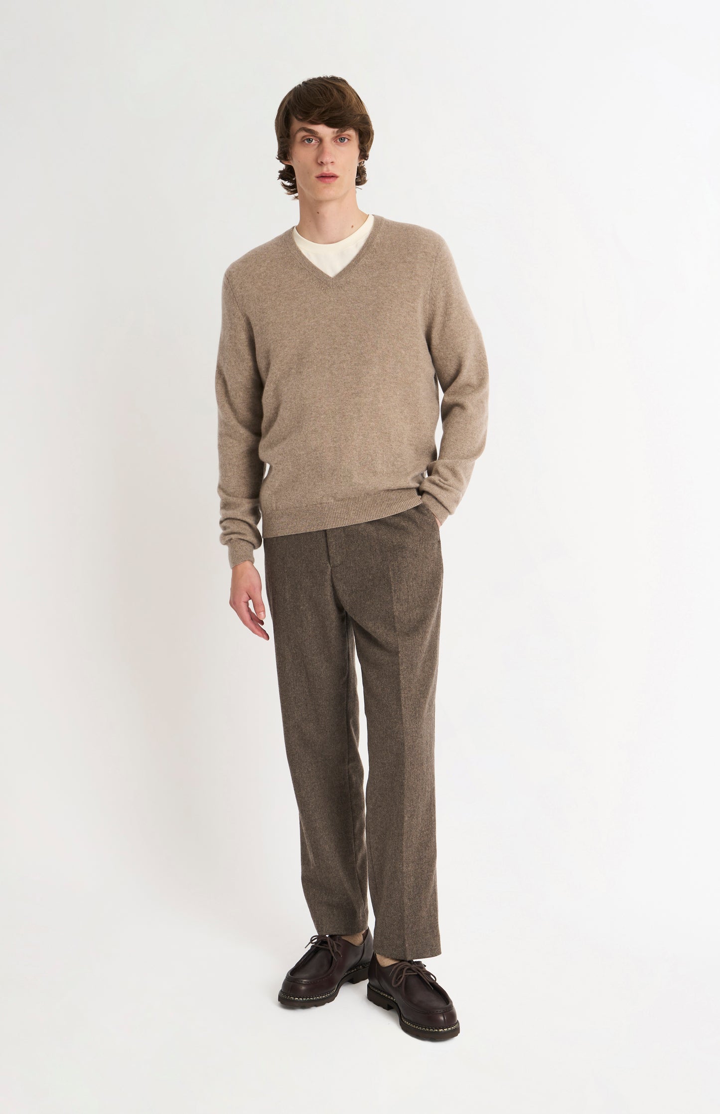 Pringle of Scotland Men’s Cashmere V-Neck Jumper In Mushroom on standing model
