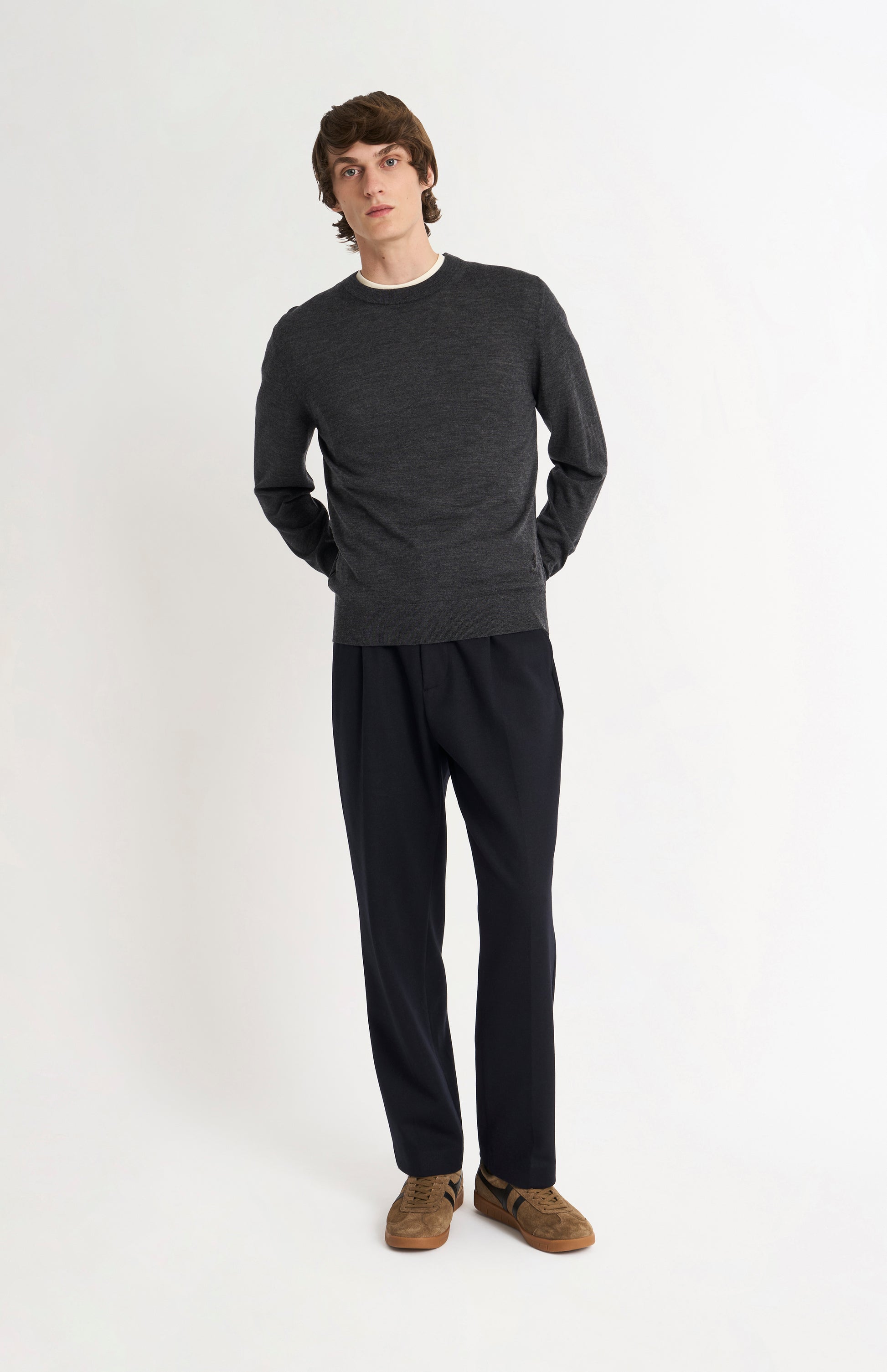 Pringle Men’s Merino Wool Crew Neck Jumper In Charcoal Melange on standing model