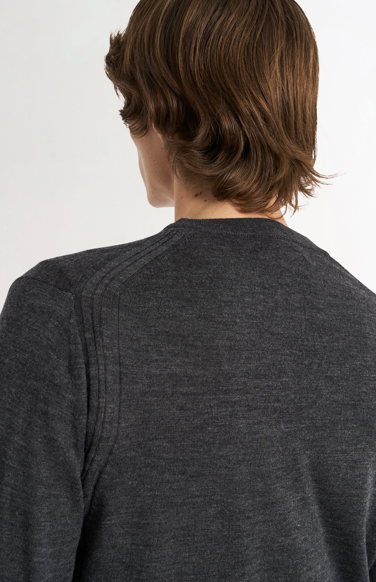 Pringle Men’s Merino Wool Crew Neck Jumper In Charcoal Melange showing back neck detail