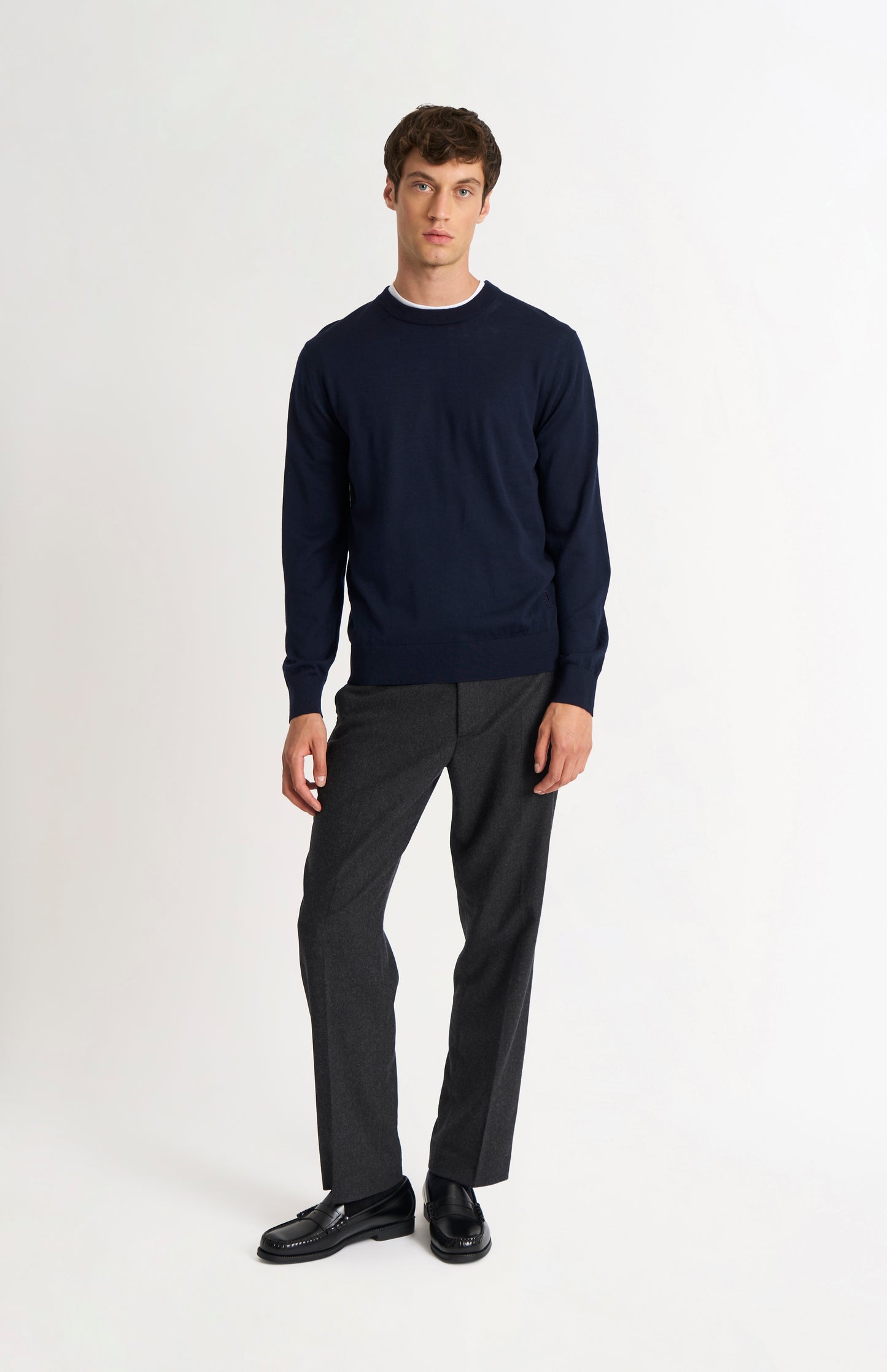 Pringle of Scotland Men’s Merino Wool  Crew Neck Jumper In Navy Blue on standing model
