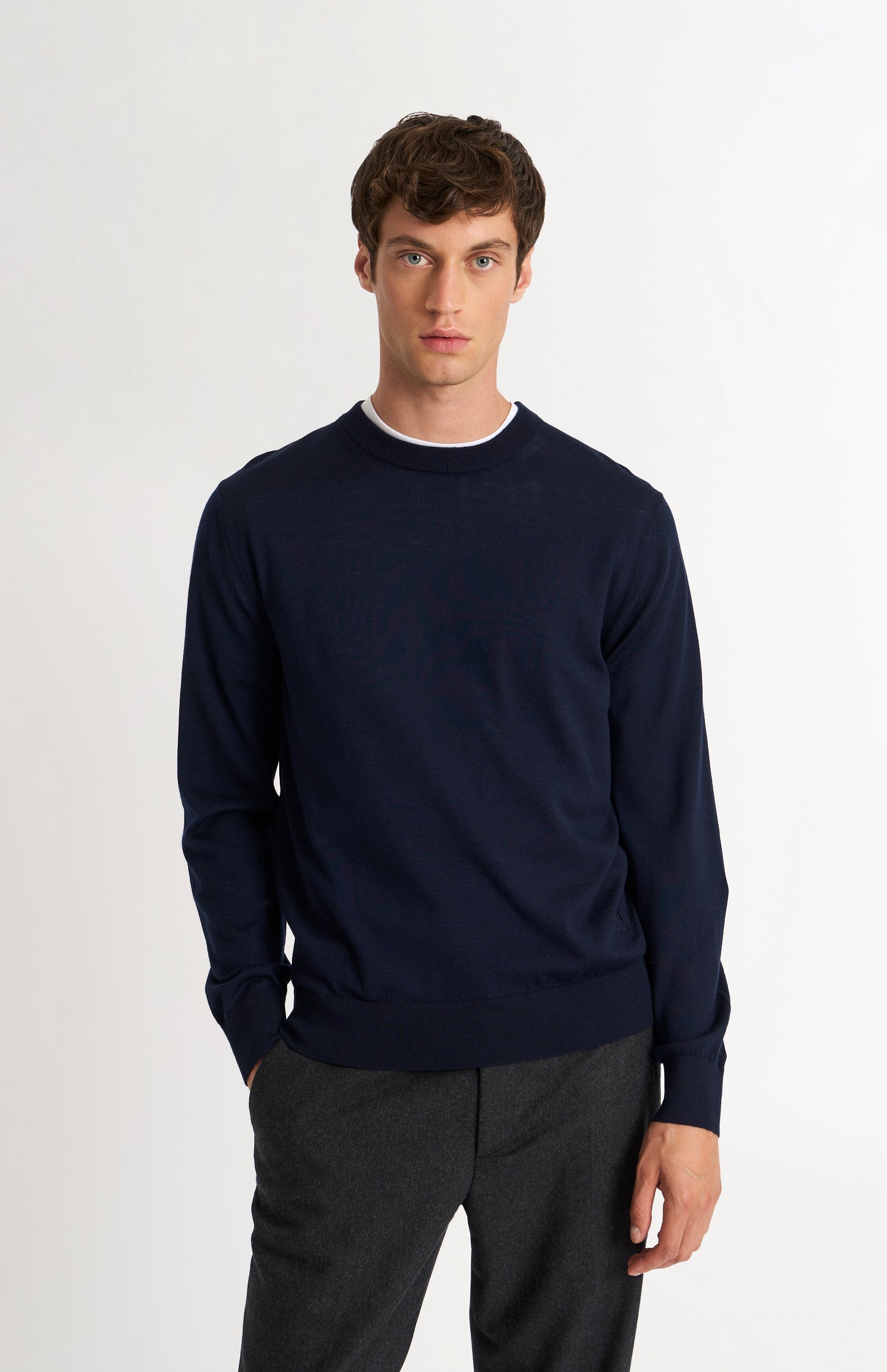 Pringle of Scotland Men’s Merino Wool  Crew Neck Jumper In Navy Blue on model