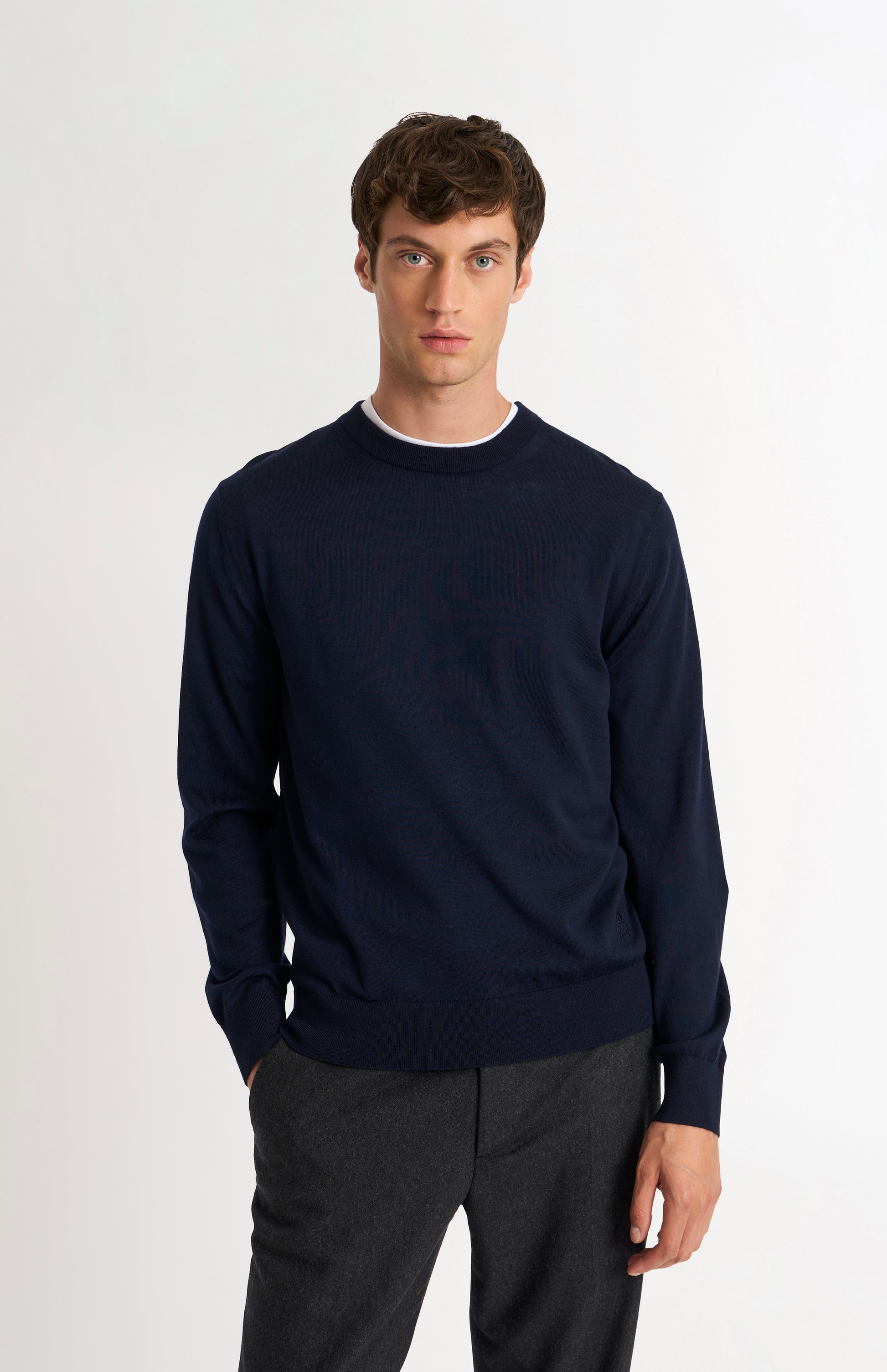 Pringle of Scotland Men’s Merino Wool  Crew Neck Jumper In Navy Blue on model