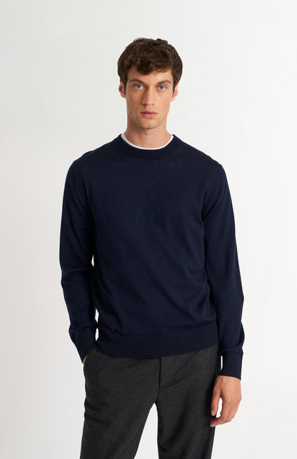 Pringle of Scotland Men’s Merino Wool  Crew Neck Jumper In Navy Blue on model