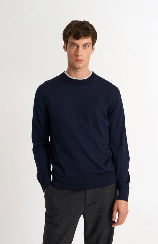 Pringle of Scotland Men’s Merino Wool  Crew Neck Jumper In Navy Blue on model