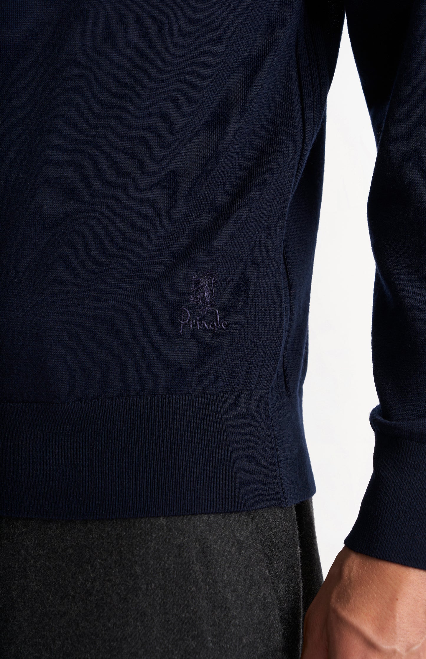 Pringle of Scotland Men’s Merino Wool  Crew Neck Jumper In Navy Blue showing lion embroidery
