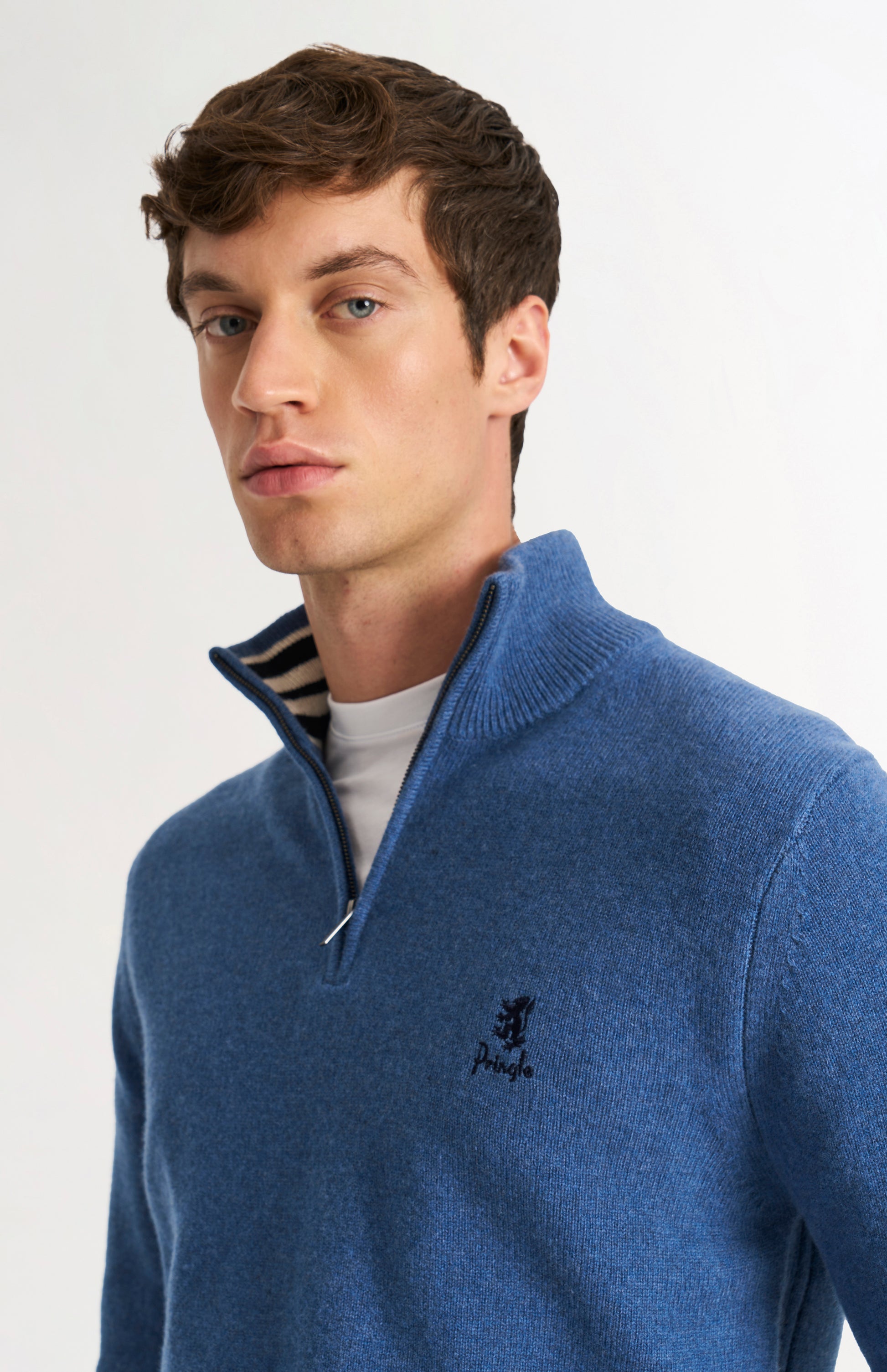 Pringle of Scotland Men’s Lambswool Qtr Zip Jumper In Bering Sea Blue showing zip neck