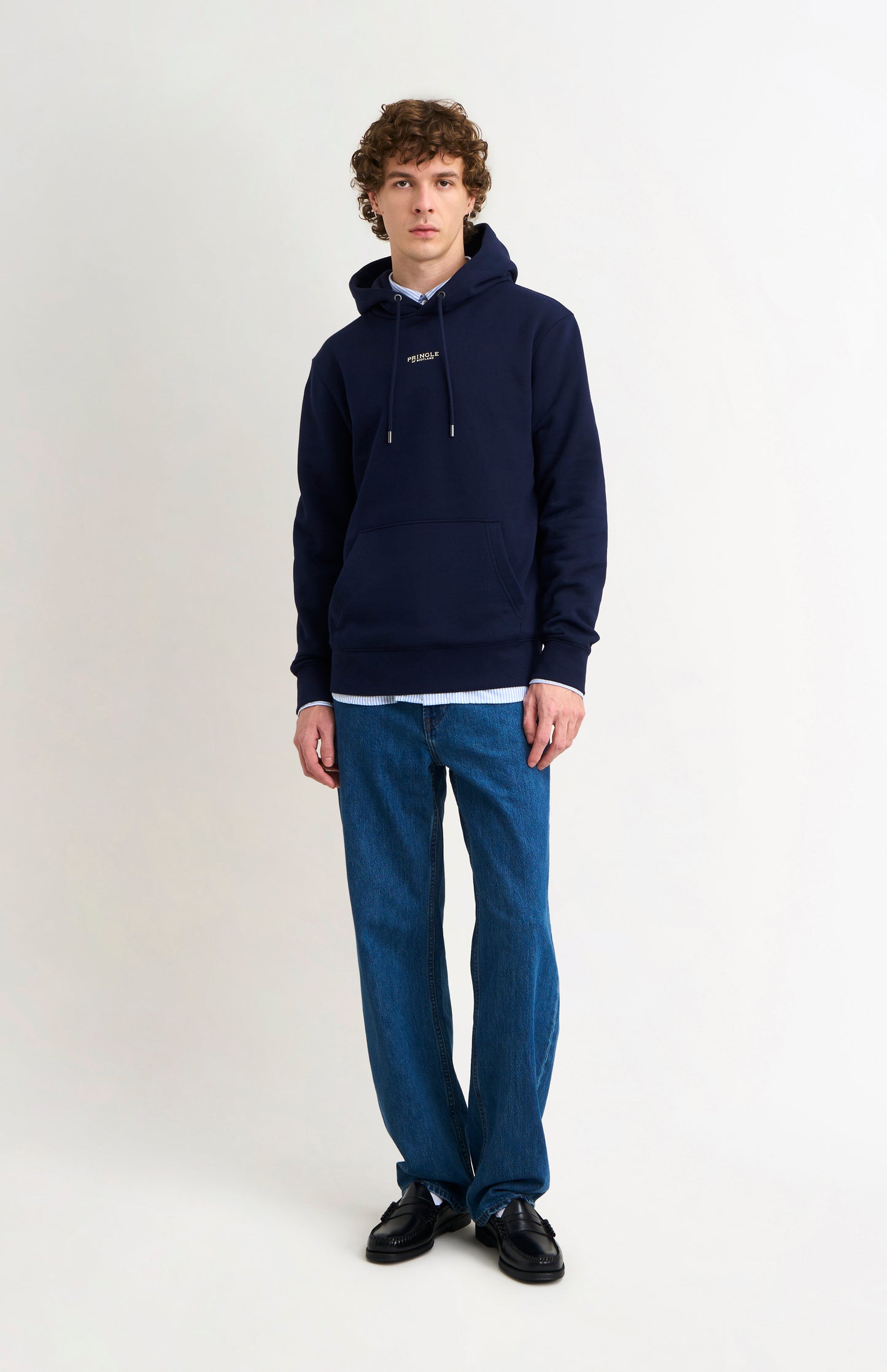 Pringle Men's Hooded Jumper In Navy Blue on model full length
