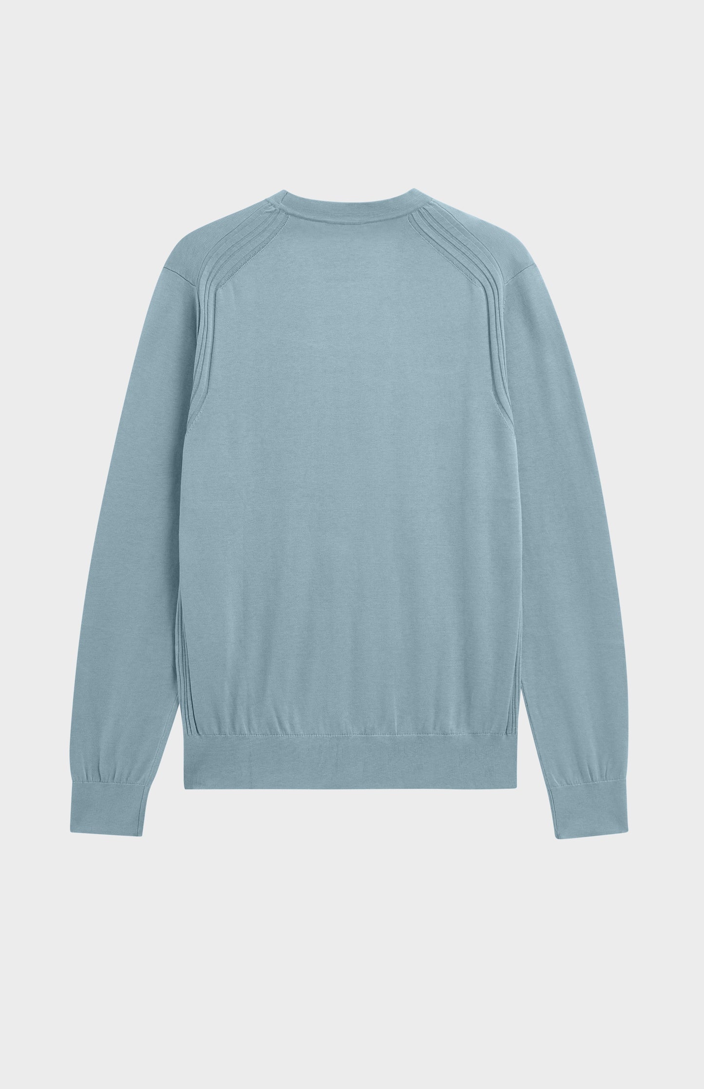 A light blue long-sleeve knit sweater shown from the back, featuring raglan-style shoulder seams, on a light gray background.