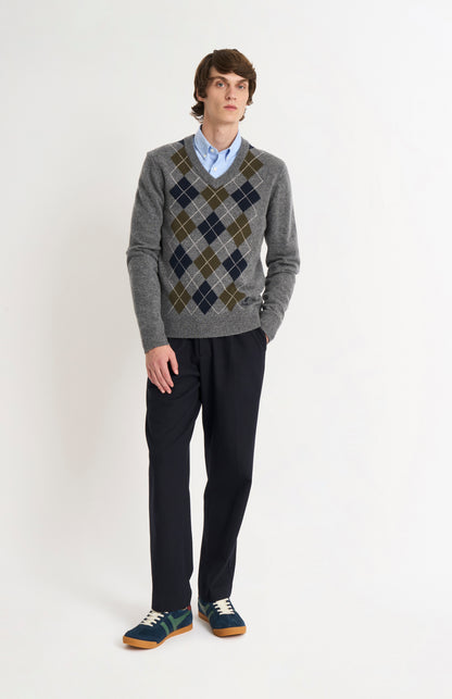 Pringle Men’s Lambswool Argyle V-Neck Jumper in Grey, Olive & Blue on model full length