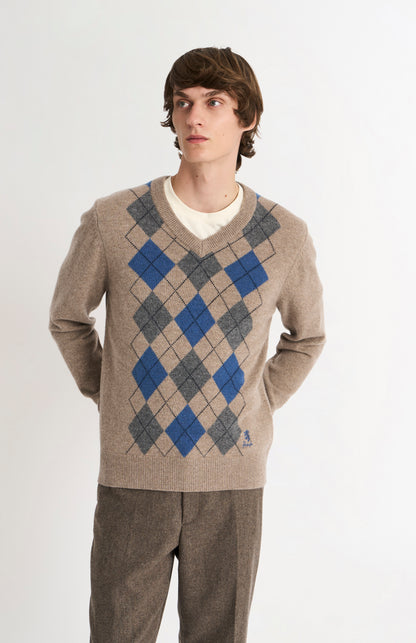 Pringle Men’s Lambswool Argyle V-Neck Jumper in  Mushroom, Blue & Grey on model