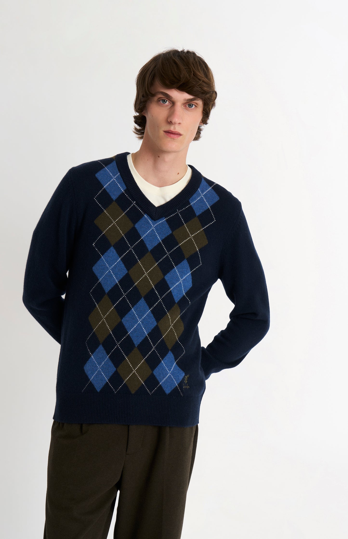 Pringle Men’s Lambswool Argyle V-Neck Jumper in Navy, Olive & Blue on model