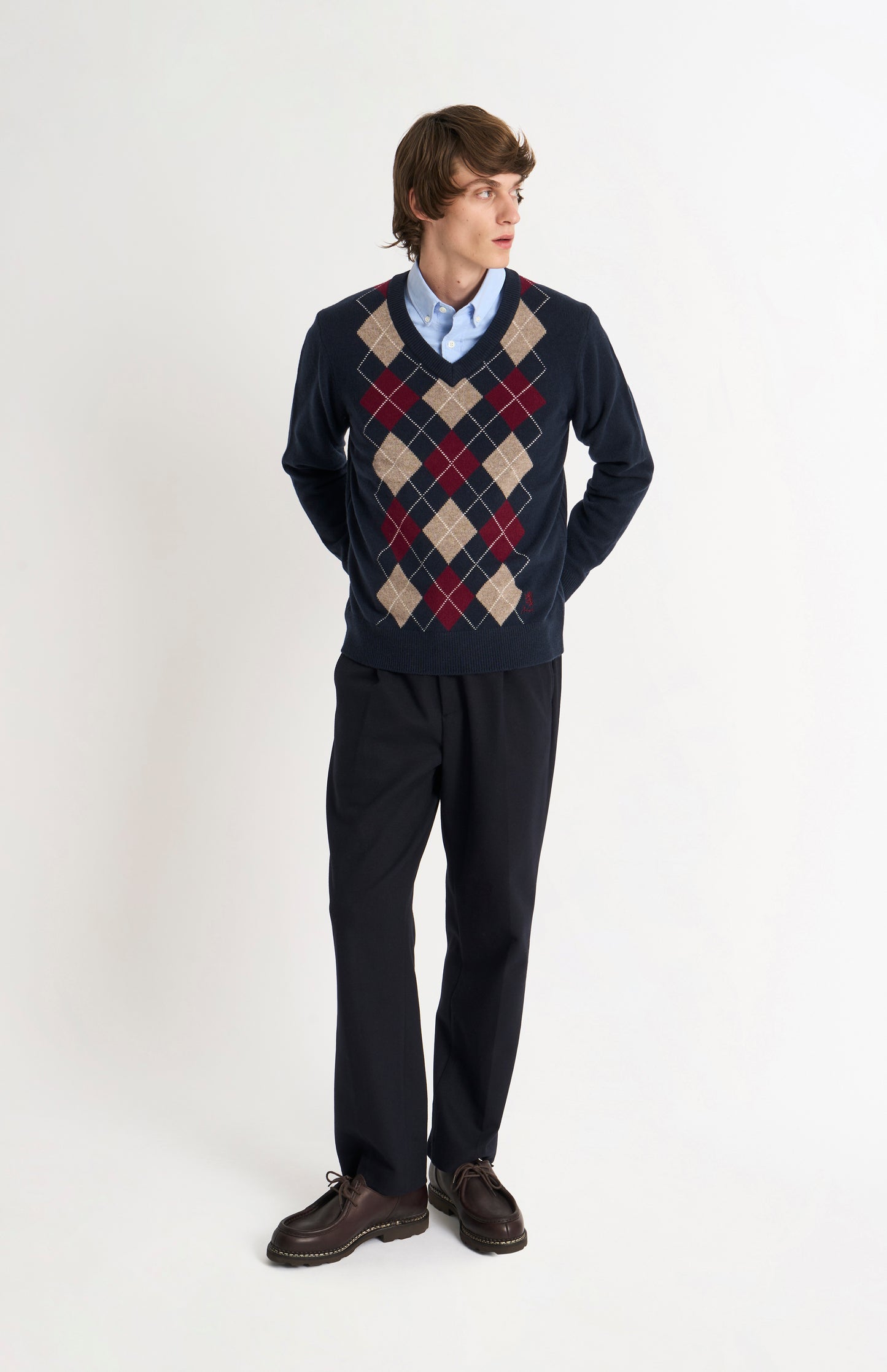 Pringle Men’s Lambswool Argyle V-Neck Jumper in Navy, Mushroom & Burgundy on model fulllength