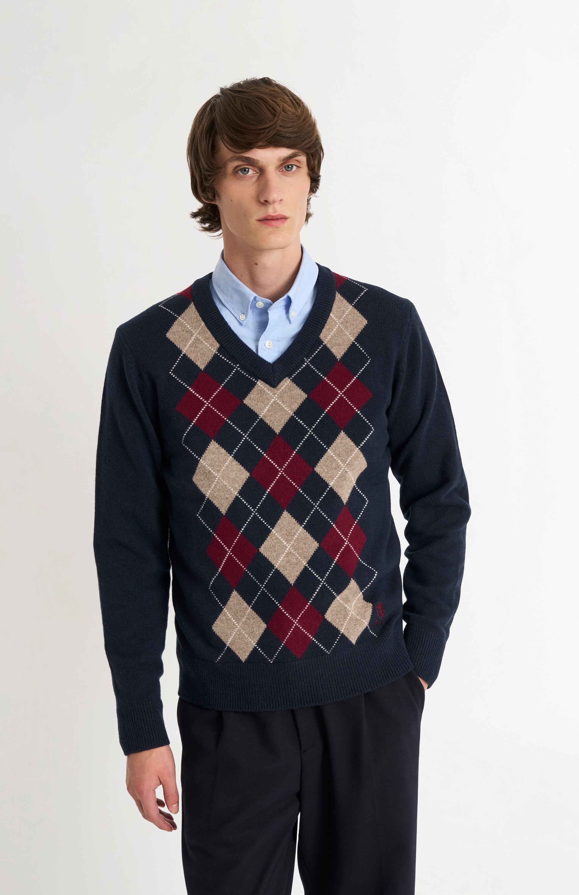 Pringle Men’s Lambswool Argyle V-Neck Jumper in Navy, Mushroom & Burgundy on model