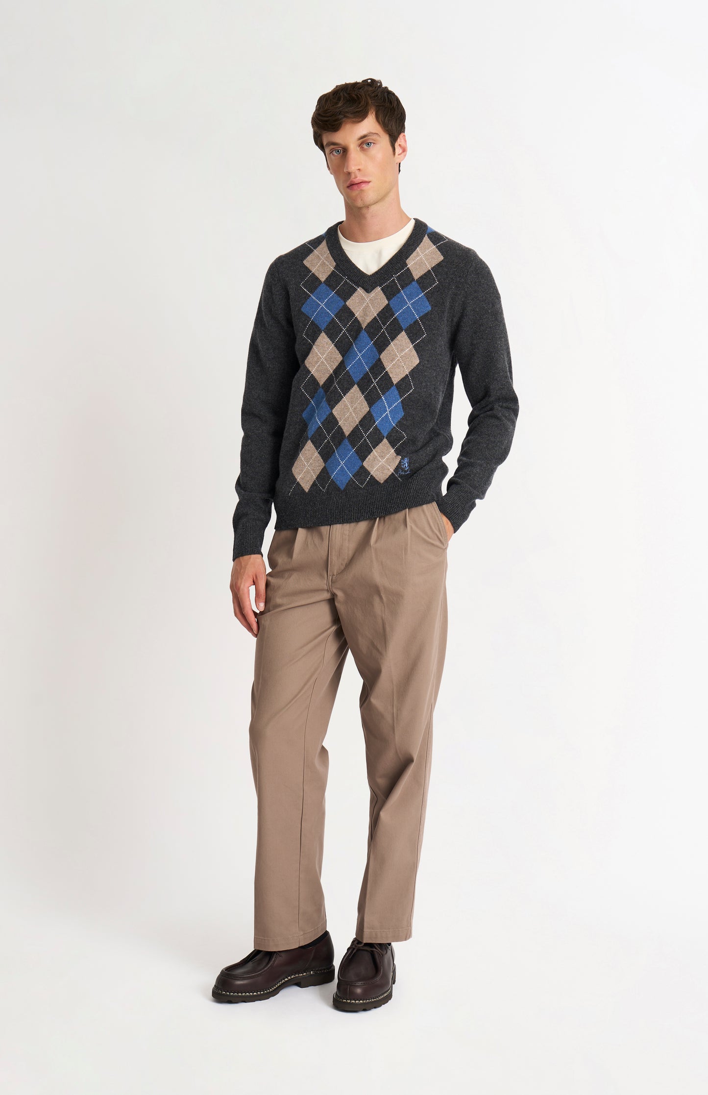 Pringle Men’s Lambswool Argyle V-Neck Jumper in Charcoal, Blue & Mushroom on model fulllength