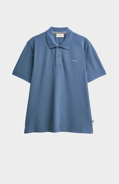 Blue polo shirt on a white background