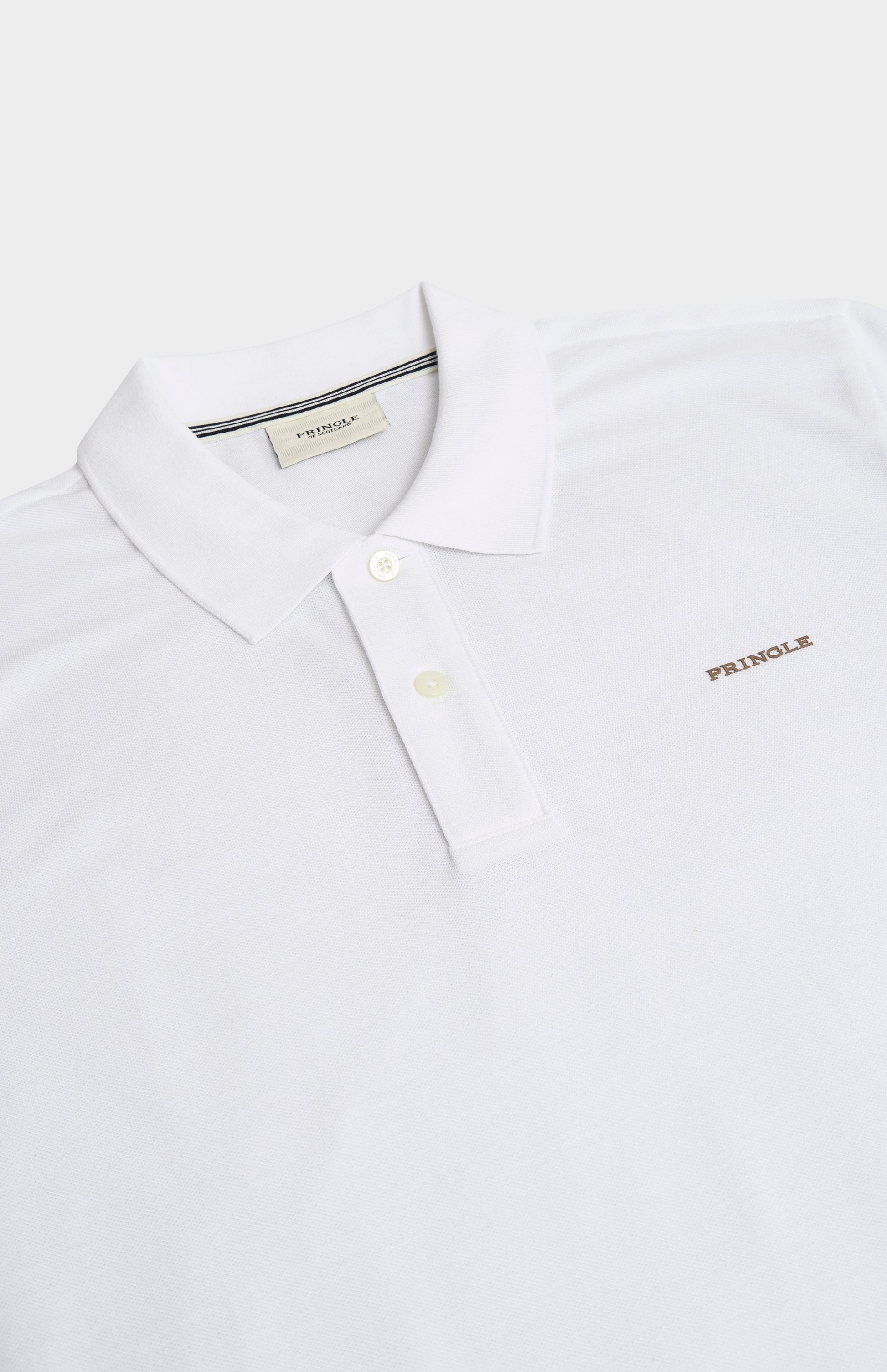 White polo shirt with 'Pringle' branding on a white background
